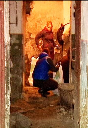Lviv residents clearing a shelter, 2015